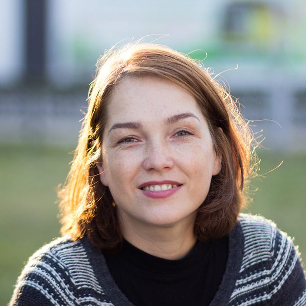 Portrait of middle aged woman in the summer park