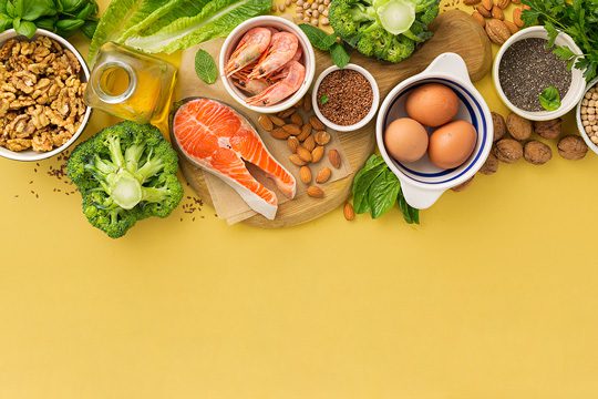 Omega 3 Food Sources And Omega 6 On Yellow Background Top View C omega 3 food sources
