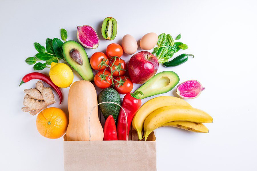 Healthy Food Background. Healthy Food In Paper Bag Fruits And Vegetables On White. Vegetarian Food. healthy food background
